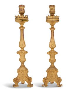 Pair of Imposing Italian Giltwood Altar Sticks: Pair of Imposing Italian Giltwood Altar Sticks 19th century, the turned candle sockets set into gilt-metal drip pans, over Baroque-style vasiform tripartite standards, lined with carved scrollwork