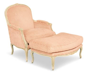 Louis XV-Style Bergere and Ottoman: Louis XV-Style Bergere and Ottoman 20th century, the polychrome carved and molded frames centered with a floral cartouche, with a reversible seat cushion, each raised on cabriole legs. armchair h.