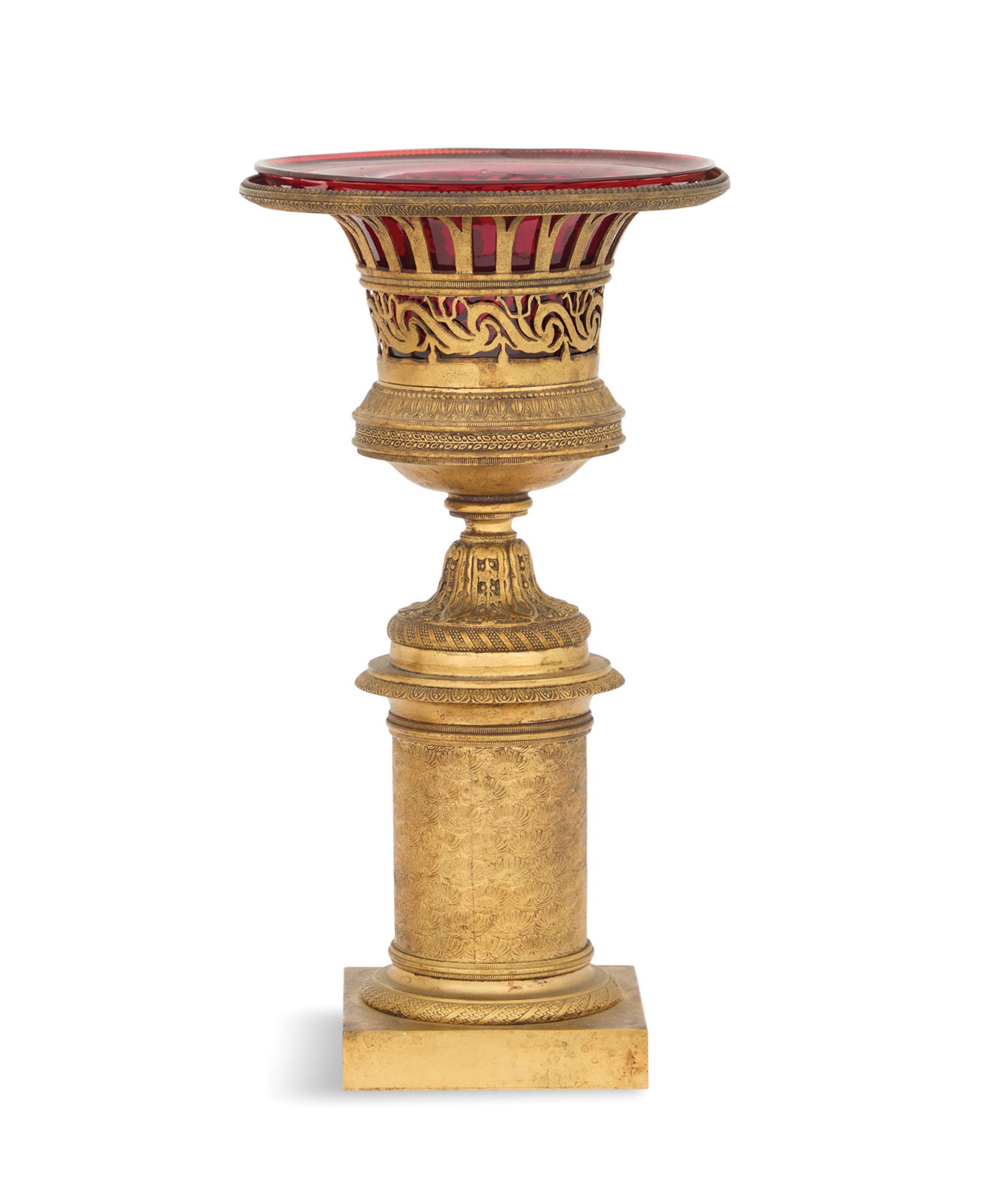 Restauration Glass-Lined Bronze Garniture Urns: French Restauration Bronze Garniture Urn19th century, the blown and polished ruby glass liner set into a pierced and gilt-bronze urn, molded with lotus leaves and vines, on a leaf-molded base, raised