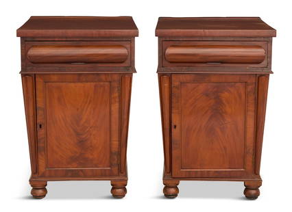 Pair of Regency Mahogany Pedestal Cabinets: Pair of Regency Mahogany Pedestal Cabinets 19th century, each with a single drawer above a framed and paneled cabinet opening to a medial shelf, raised on bun feet. h. 38-1/2", w. 25-1/2", d. 31"