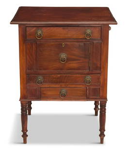 English Late Regency Mahogany Side Table: English Late Regency Mahogany Side Table 19th century, the molded, overhanging top above a case fitted with four drawers, raised on turned legs. h. 34", w. 27", d. 22-1/2" Provenance: