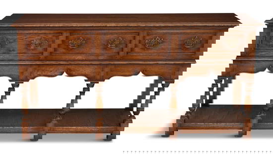 Georgian-Style Stained Oak Welsh Sideboard: Georgian-Style Oak Welsh Sideboard contemporary, of traditional form with a rectangular top and molded edge, the front with three drawers over scalloped aprons and open shelves below. h.