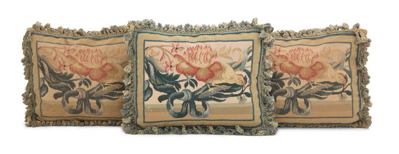 Collection of Three Aubusson Tapestry Pillows: Collection of Three Needlepoint Tapestry Pillows 19th century and later, the collection including three pillows decorated with water lilies on a green ground, trimmed with tasseled fringe, w.