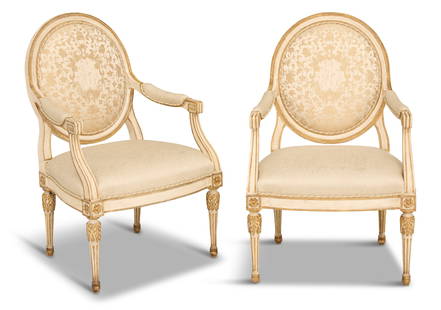 Pair of Louis XVI-Style Creme-Peinte Fauteuils: Pair of Louis XVI-Style Creme-Peinte Fauteuils contemporary, attributed to Dennis & Leen, each with an oval padded back and groove-carved arms, raised on turned and fluted legs. h. 40", w.