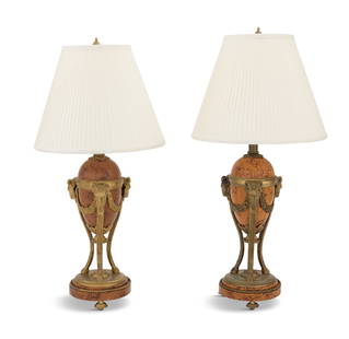 Pair of Bronze-Mounted Lamps: Pair of Bronze-Mounted Lamps in the Neoclassical Taste in the form of garnitures, decorated with faux bois, on bronze monopodial supports terminating in ram's heads, hung with bronze floral swags, on