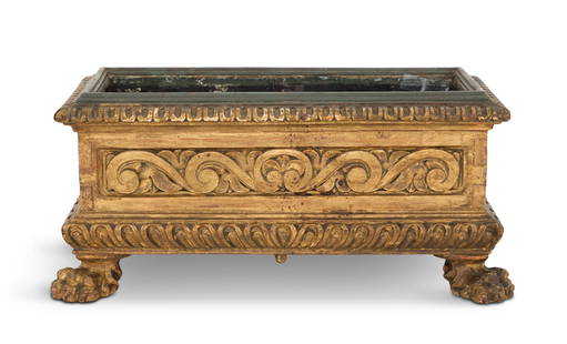 Italian Giltwood Jardiniere in the Baroque Taste: Italian Giltwood Jardiniere in the Baroque Taste 19th century, the rectangular jardiniere with a fluted rim, the side panels carved with scrollwork and honeysuckle, with a gadrooned lower edge, on