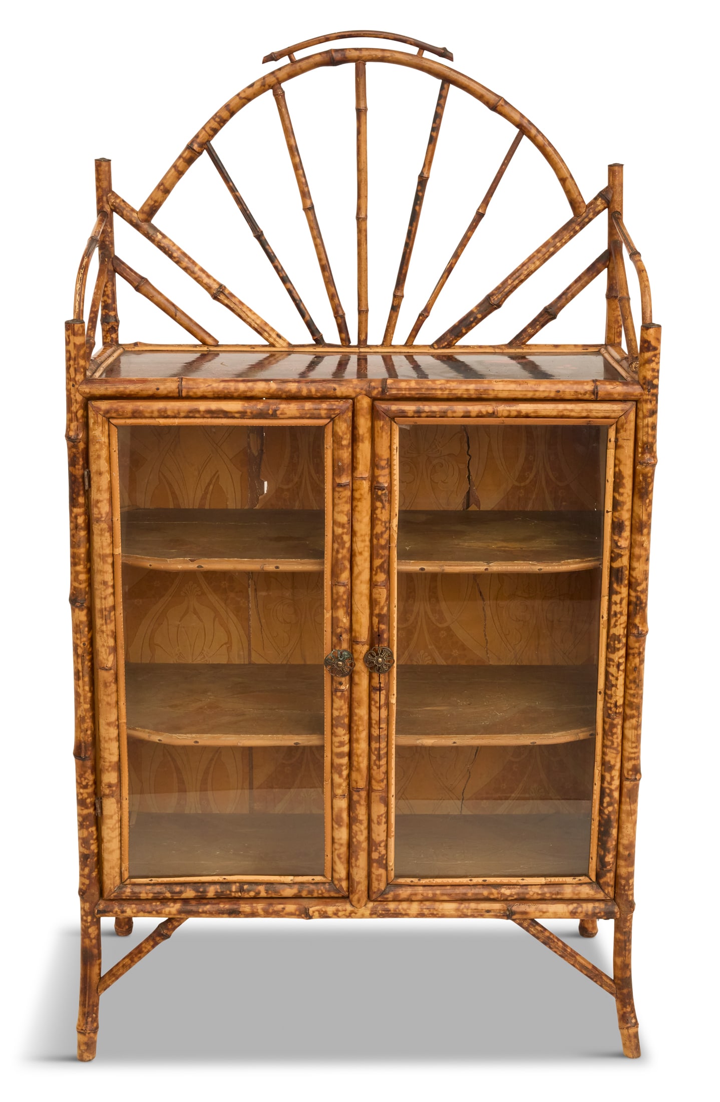 Bamboo Vitrine in the Anglo-Japonesque Taste: Bamboo Vitrine in the Anglo-Japonesque Taste early 20th century, the fan-form bamboo gallery over a decorated shelf, above two glass doors opening to an interior with three shelves. h. 57-1/2", w