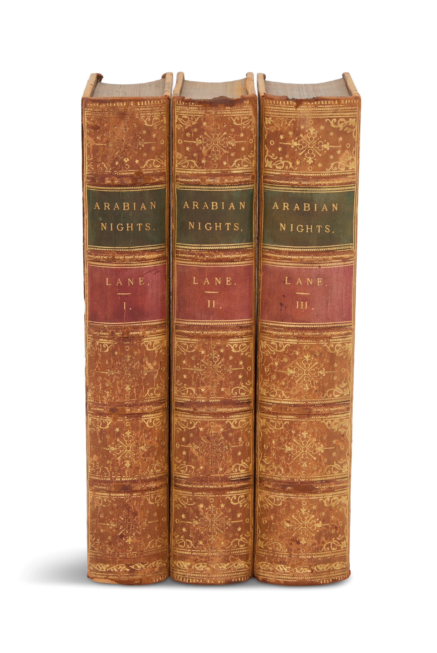 Edward William Lane, trans., Arabian Knights: Edward William Lane, trans., Arabian KnightsLondon: Routledge, Warne & Routledge, 1865; three volumes (complete), Edward Stanley Poole, ed., woodcut illustrations after William Harvey, in full tan tre