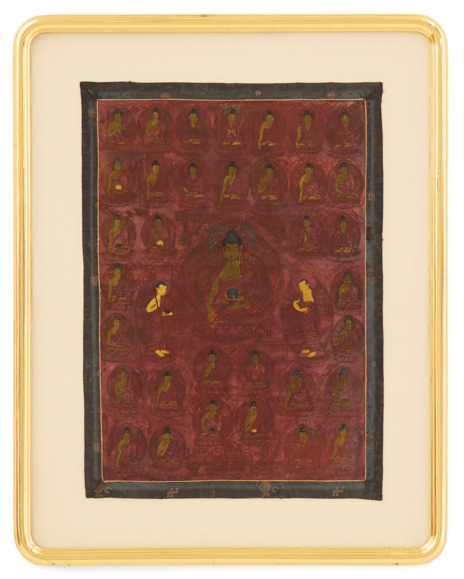 Thangka Buddha of Shakyumuni: Thangka Buddha of Shakyumuni 18th/19th century, Tibetan, depicted holding an alms bowl, on his lotus throne, flanked by guardians and with various buddhas and attendants, in a contemporary giltwood fr
