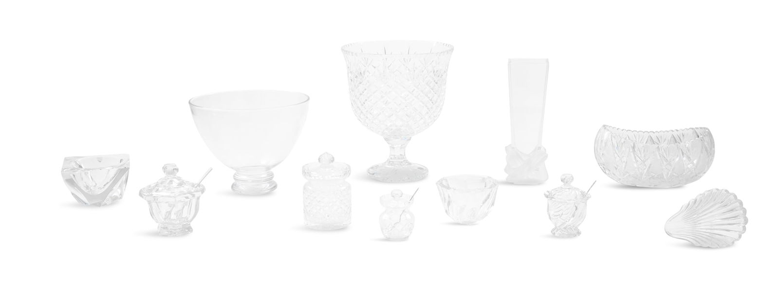 Twelve-Piece Collection of Colorless Art Glass: Twelve-Piece Collection of Colorless Art Glassincluding a Simon Pearce blown-glass footed bowl, h. 8-1/2", dia. 10-1/2", a Simon Pearce molded bowl on pedestal, h. 12-1/4", dia. 10"