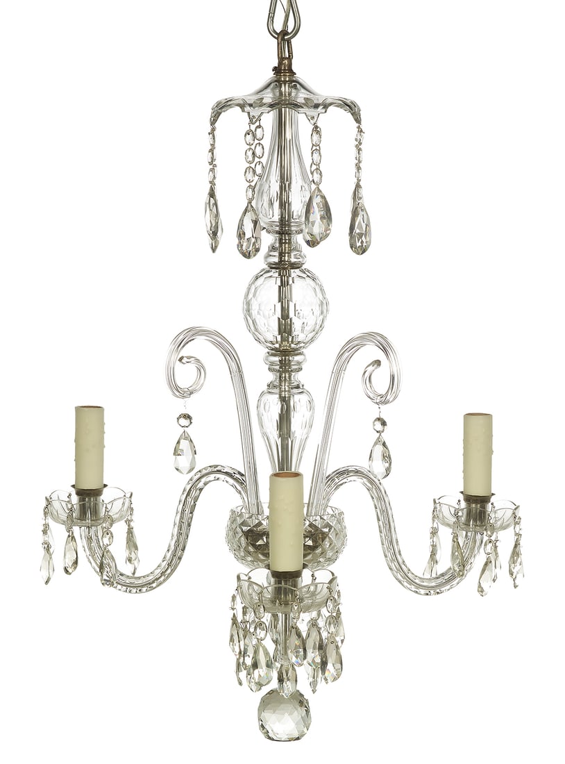 Cut-Glass Chandelier in the Anglo-Irish Taste: Cut-Glass Chandelier in the Anglo-Irish Taste20th century, the scalloped prism-hung canopy overhanging the cut standard, set among three glass scrolls, the cut-glass scrolled arms terminating in glass