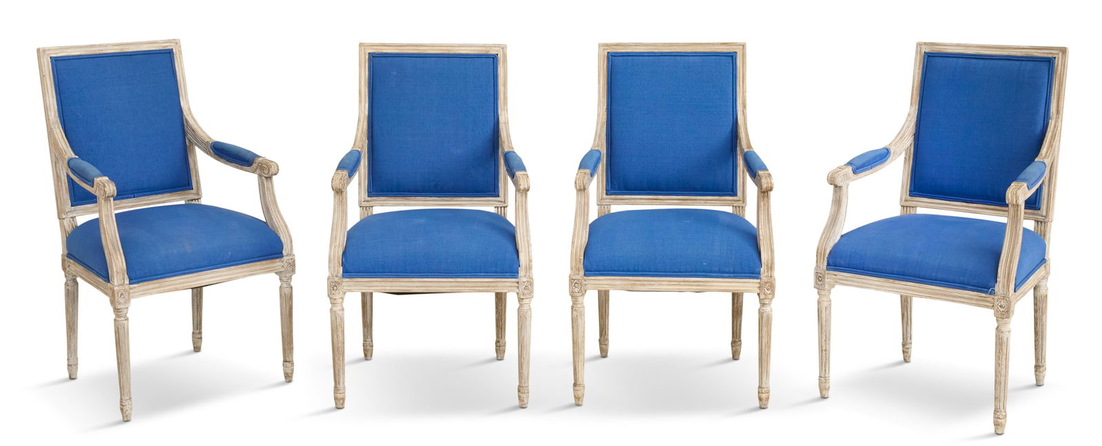 Suite of Four Pickled Oak Fauteuils: Suite of Four Pickled Oak Fauteuilsin the Louis XVI taste, Restoration Hardware, each with a molded frame, padded back, seat and armrests, and raised on turned and fluted circular legs.h. 40", w.