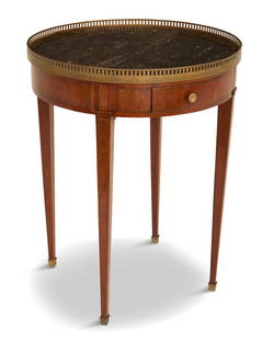 Louis XVI-Style Marble-Top Center Table: Louis XVI-Style Marble-Top Center Tablelate 19th century, the mahogany table with a circular marble top within a full pierced brass gallery, above a conforming frieze fitted with two small drawers, ra