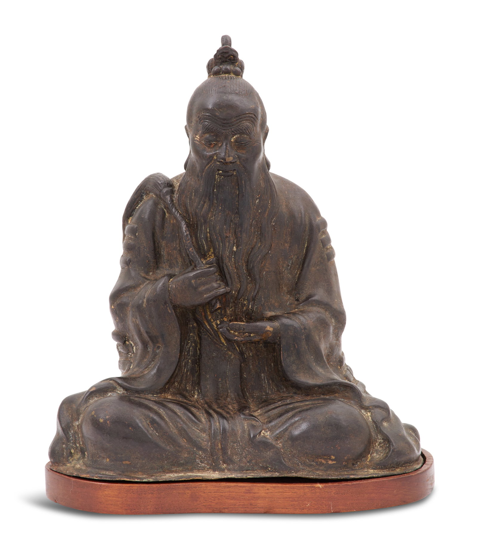 Chinese Bronze Figure of Lao-Tzu: Chinese Bronze Figure of Lao-Tzu late 18th/early 19th century, the sage seated in a meditative pose with a fly whisk in one hand and a kernel in the other, on a wooden base. h. 12-1/4", w. 10", d. 6" 
