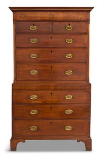 George III Mahogany Chest-on-Chest: George III Mahogany Chest-on-Chest19th century, the molded rectangular cornice with Greek-key inlay, above a shell- and patera-inlaid frieze, over two short drawers and three long graduated drawers, t