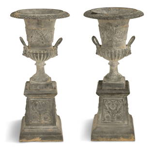 Pair of Cast-Metal Garden Urns on Stands: Pair of Cast-Metal Garden Urns on Standsin the neoclassical taste, the campana-form urns molded with scrollwork and the reeded bases set with handles, on pylon-form stands molded with panels of scroll
