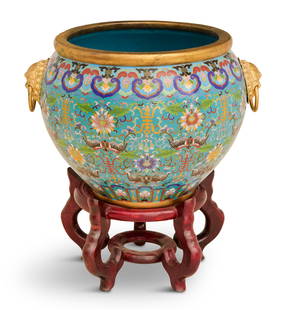 Chinese Cloisonne Jardiniere on Stand: Chinese Cloisonne Jardiniere on Stand19th century, the jardiniere decorated with characters, shaded lotus blossoms and scrolls on a turquoise ground, the sides mounted with carefully molded gilt-bronz