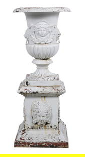 Monumental Victorian Cast-Iron Garden Urn: Monumental Victorian Cast-Iron Campana-Form Garden Urnfirst quarter 19th century, the urn decorated with a scroll-framed masque, the sides with lion's-head ring pulls, the plinths with unusual scroll-