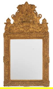 Louis XIV Giltwood Mirror: Louis XIV Giltwood Mirrorca. 1700, the arched crest trimmed in anthemia, gadrooning and rocaille work, with a basket of fruit supported on bas-relief scrollwork, the ogee mirror surround decorated wit