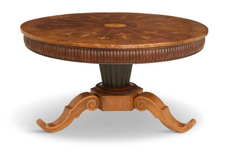 Continental Mixed-Woods-Inlaid Table: Continental Mixed-Woods-Inlaid Tablesecond quarter19th century, the circular top with a banded and line-inlaid border, mounted to a large turned and fluted pedestal, to a platform base with three larg