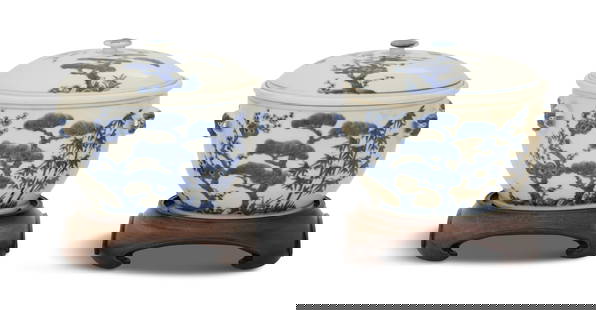 Pair of Chinese Export Covered Bowls: Pair of Chinese Export Covered Bowlsca. 1875-1908, the blue-and-white bowls decorated with pine trees and bamboo, the sides with molded foo dog head handles, and the interiors with liners, each with a