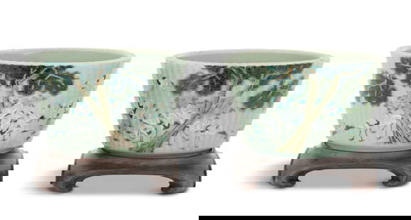 Pair of Chinese Export Jardinieres: Pair of Chinese Export Jardinieres20th century, each ribbed jardiniere decorated with a flock of enameled cranes resting beneath a pine tree, on wooden stands.h. 7-1/4", w. 8-1/4", d. 8-1/4" Provenanc