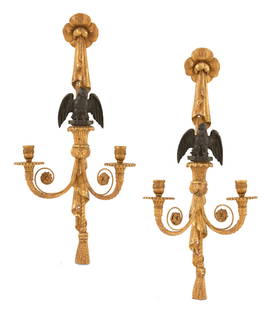 Pair of Caldwell Giltwood and Gilt-Bronze Sconces: Pair of Caldwell Giltwood and Gilt-Bronze Sconcesfirst quarter 20th century, in the Regency taste, each backplate in the form of a carved sash with a tasseled end, decorated with an ebonized eagle and
