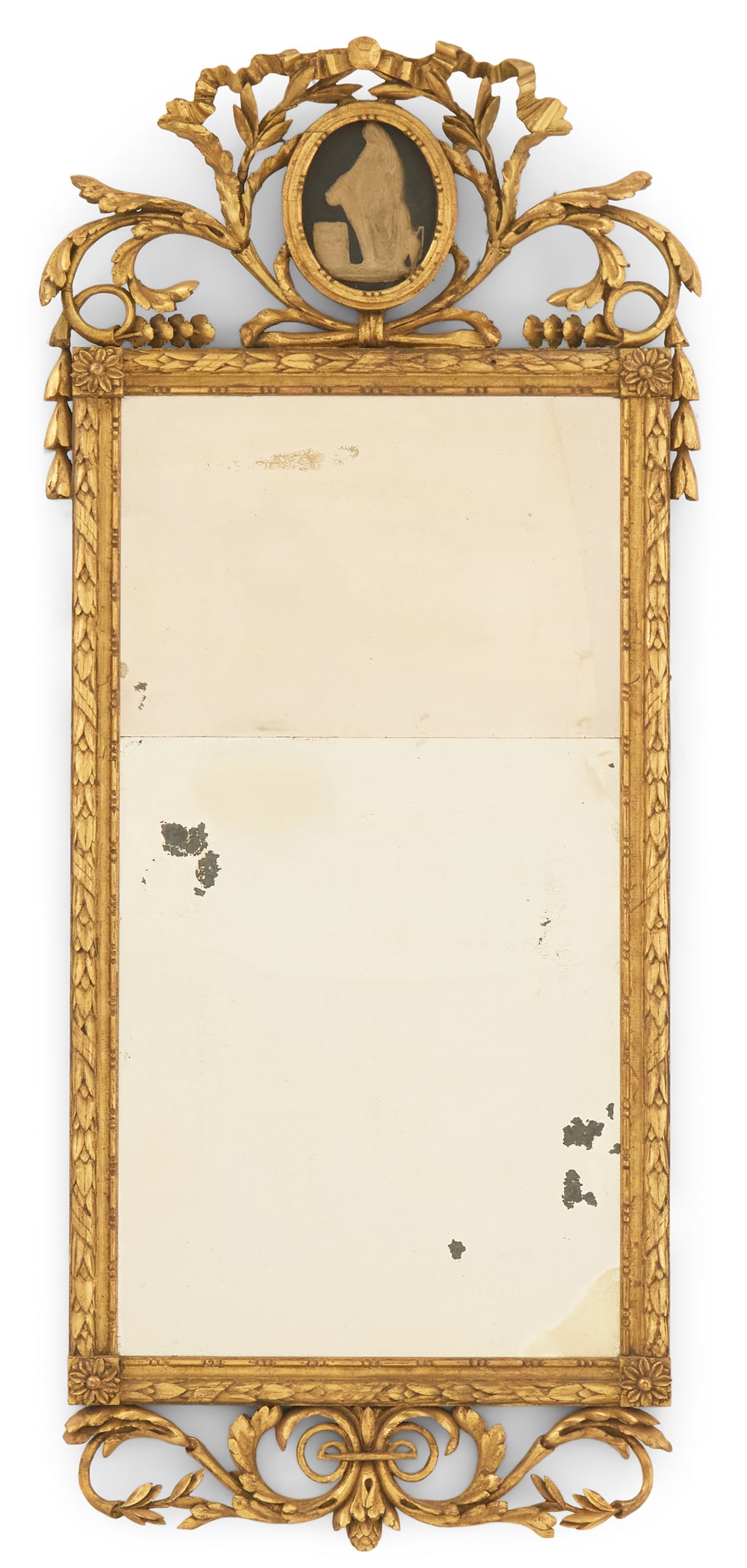 Swedish Gustavian Giltwood Mirror: Swedish Gustavian Giltwood Mirrorca. 1800, the crest with a molded "widow" roundel, set into a carved and pierced laurel wreath frame with acanthus leaves, the surround with medallion-carved corners,