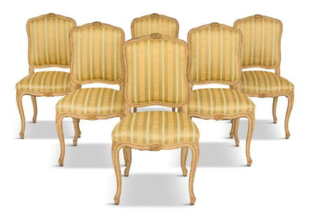 Suite of Six Louis XV-Style Side Chairs: Suite of Six Louis XV-Style Side Chairs19th century, peint a la creme and parcel-gilt, the crest and skirt carved with a small cabochon-centered leaf, upholstered in gold ribbon-striped celadon silk.h