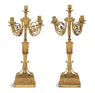 Pair of French Gilt-Bronze Candelabra: Pair of French Gilt-Bronze Candelabrathird quarter 19th century, the leaf-molded and scrolled candle branches terminating in laurel-decorated candle sockets and drip pans, emanating from quiver-form f