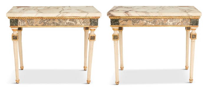 Creme-Peinte, Parcel-Gilt and Marble-Top Consoles: Pair of Italian Creme-Peinte, Parcel-Gilt and Marble-Top Console Tables18th century, each with a thick, rectangular marble top over a specimen marble frieze trimmed with carved and gilded moldings, ra