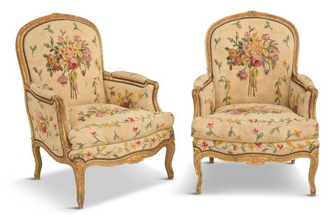 Pair of Louis XV-Style Polychrome Bergeres: Pair of Louis XV-Style Polychrome Bergeres19th century, the parcel-gilt bergeres with carved and molded frames, with floral back crests, covered in floral Aubusson-style fabric, raised on cabriole leg