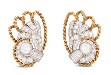 Pair of Diamond Ear Clips: Pair of Diamond Ear Clips14k yellow gold, the ear clips mounted with round brilliant-cut and baguette-cut diamonds weighing approximately 1.96 carats in total.l. 7/8", total weight 10.3 grams