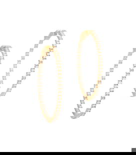 Pair of Diamond Hoop Earrings: Pair of Diamond Hoop Earrings14k yellow gold, the inside/outside round earrings mounted with round brilliant-cut diamonds weighing approximately 1.55 carats in total.l. 1-1/4", total weight 7.0 grams
