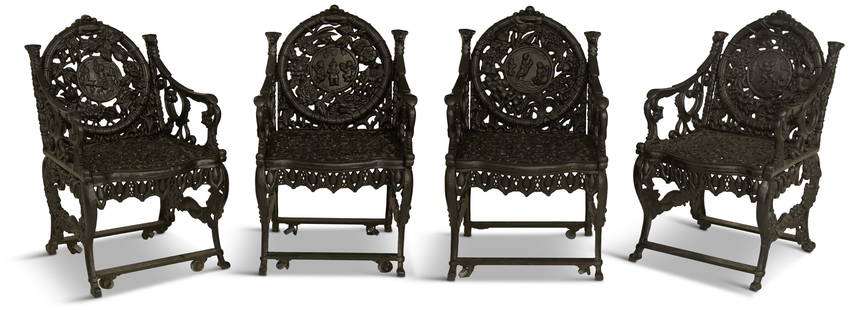 Set of Four Northampton Cast-Iron Garden Chairs: Set of Four Northampton Cast-Iron Garden Chairsthe "four seasons" chairs inspired by Coalbrookdale, the circular backs decorated with seasonal roundels framed in pierced fruit and flowers, the scrolle