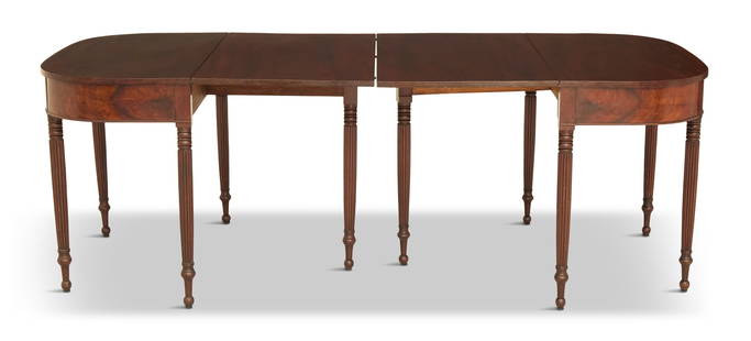 American Federal Mahogany D-End Dining Table: American Federal Mahogany D-End Dining Table in the Sheraton Tastefirst quarter 19th century, Philadelphia, in two parts, each with a figured single-board top and like drop leaf, over a conforming apr