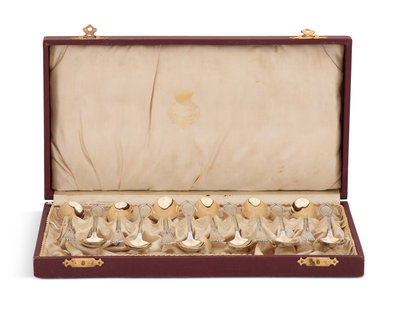 Twelve Swedish "Tulpan" Silver Demitasse Spoons: Cased Set of Twelve Swedish "Tulpan" ("Tulip") Silver Demitasse Spoons1906, Stockholm, by C.G. Hallberg, .830 silver, with gilt bowls, monogrammed "HL", l. 4-1/4", presented in the original fitted cre