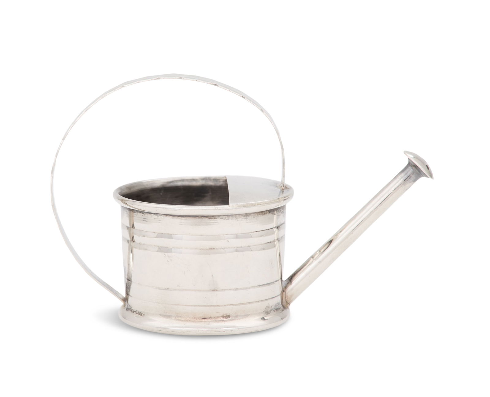Cartier Sterling Silver Vermouth Dropper: Cartier Sterling Silver Vermouth Droppermid-20th century, New York, in the form of a functioning watering can, with embossed banding and bevel-edged strap handle.h. 2-3/4", dia. 2-1/8", l. 4-1/4"; 1.6