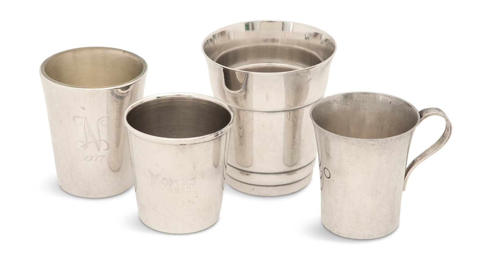 Four Silver and Silverplate Shot Cups: Collection of Four Silver and Silverplate Shot Cups second half 20th century, all of traditional slightly tapering cylindrical form, including: a sterling silver single shot, Tiffany & Co., slightly e