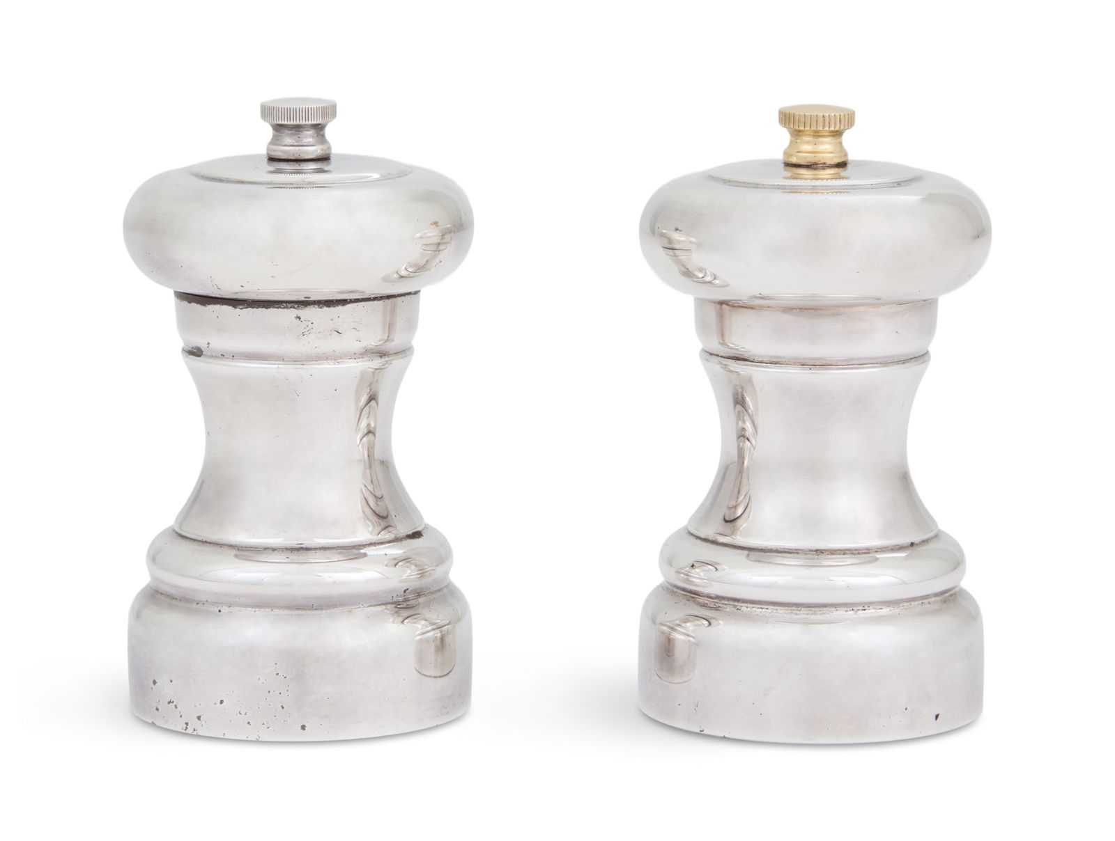 English Sterling Silver Salt & Pepper Mills: English Sterling Silver Salt & Pepper Millshallmarked Sheffield, 2002, by Carr's of Sheffield, each of baluster form with plastic and steel mechanism, the pepper with gilt adjusting screw.h. 4", dia.