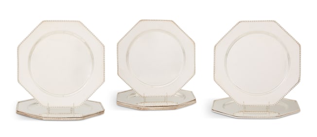 Twelve Continental Silverplate Service Plates