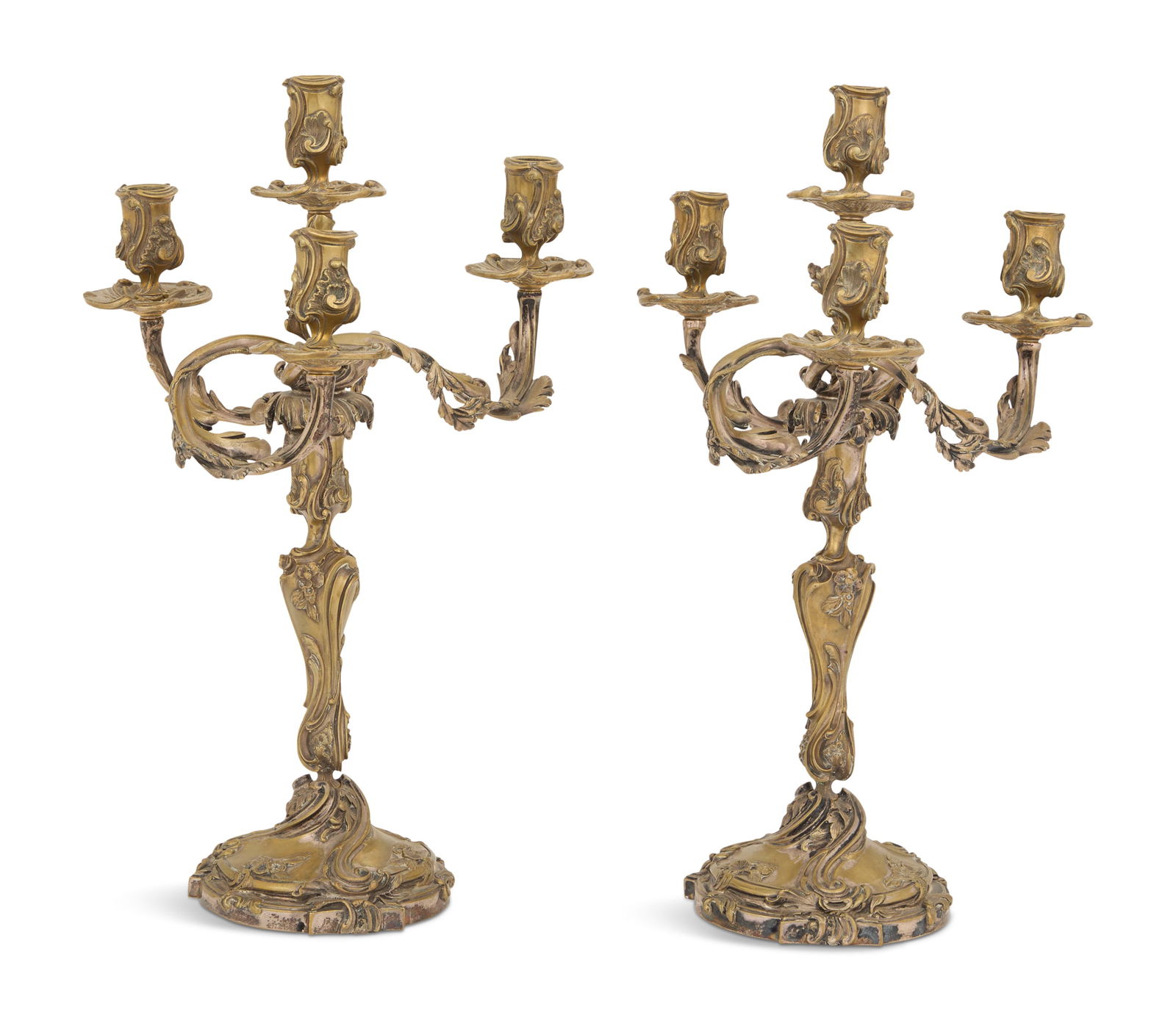 Pair of French Bronze Candelabra: Pair of French Bronze Candelabralate 19th century, in the Louis XV taste, decorated with robust openwork acanthus scrolls, each with a baluster standard above a domed base and surmounted by a nozzle f