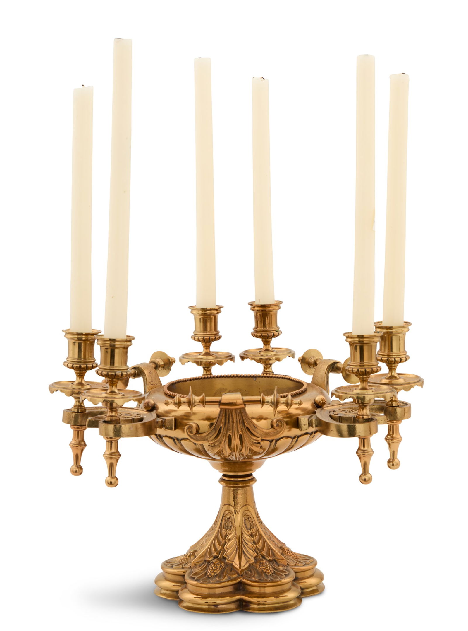 English Brass Neo-Grec Centerpiece: English Brass Neo-Grec Centerpiecelate 19th century, the lobed bowl with a beaded liner on the interior, set with six candle holders supported on anthemion-decorated arms, on a tapered and scalloped b