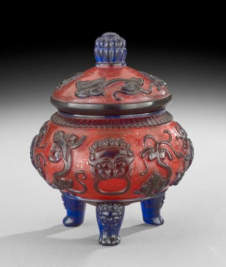 Chinese Peking Glass Censer: Chinese Peking Glass Censer, 20th century, cameo-carved from blue to a gold-flecked red ground with a design of bats surrounding Shou characters with flanking kylin, Ch'ien Lung mark on the base, h. 8