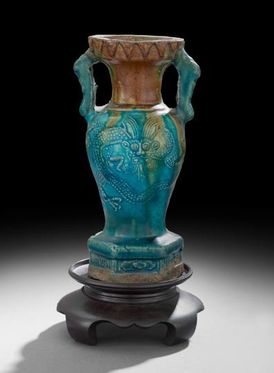 Chinese Stoneware Vase: Chinese Stoneware Vase, Ming period (1368-1644), San Tsai ware, with impressed dragon decoration, the surface glazed in straw and turquoise colors, h. 8".