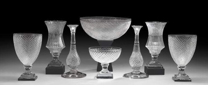 Eight-Pieces of Diamond-Cut Lead Crystal: Eight-Piece Collection of Diamond-Cut Lead Crystal, in the style of Cristalleries de St. Louis, France, the collection comprised of a punch bowl, h. 6-3/4", dia. 15"; a pair of vase-shaped candlestick