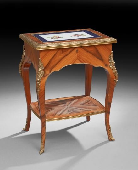 Louis XV-Style Zebra Wood Occasional Table: Louis XV-Style Zebra Wood Occasional Table, early 20th century, the rectangular top with an ormolu banding and centered by a floral-patterned porcelain plaque, hinged and opening to a compartmented in