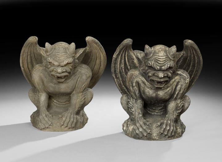Pair of Weathered Cast Cement Garden Figures: Large Pair of Weathered Cast-Cement Garden Figures, in the form of winged gargoyles or bats, h. 26", w. 24", d. 18".