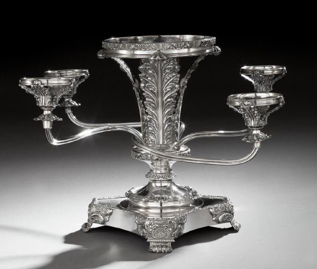 William IV Old Sheffield Plate Epergne: William IV Old Sheffield Plate Epergne, second quarter 19th century, with an acanthus-frond standard above a knopped, canted and cavetto square plinth base, with applied rocaille banding and four reed