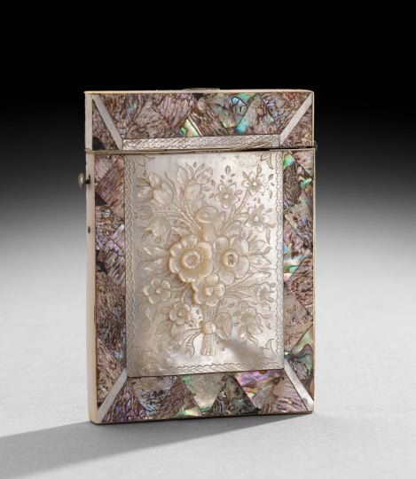 Continental Mother-of-Pearl Card Case: Continental Mother-of-Pearl Card Case, fourth quarter 19th century, decorated with a bas-relief spray of flowers and inlaid abalone borders, h. 4", w. 3".